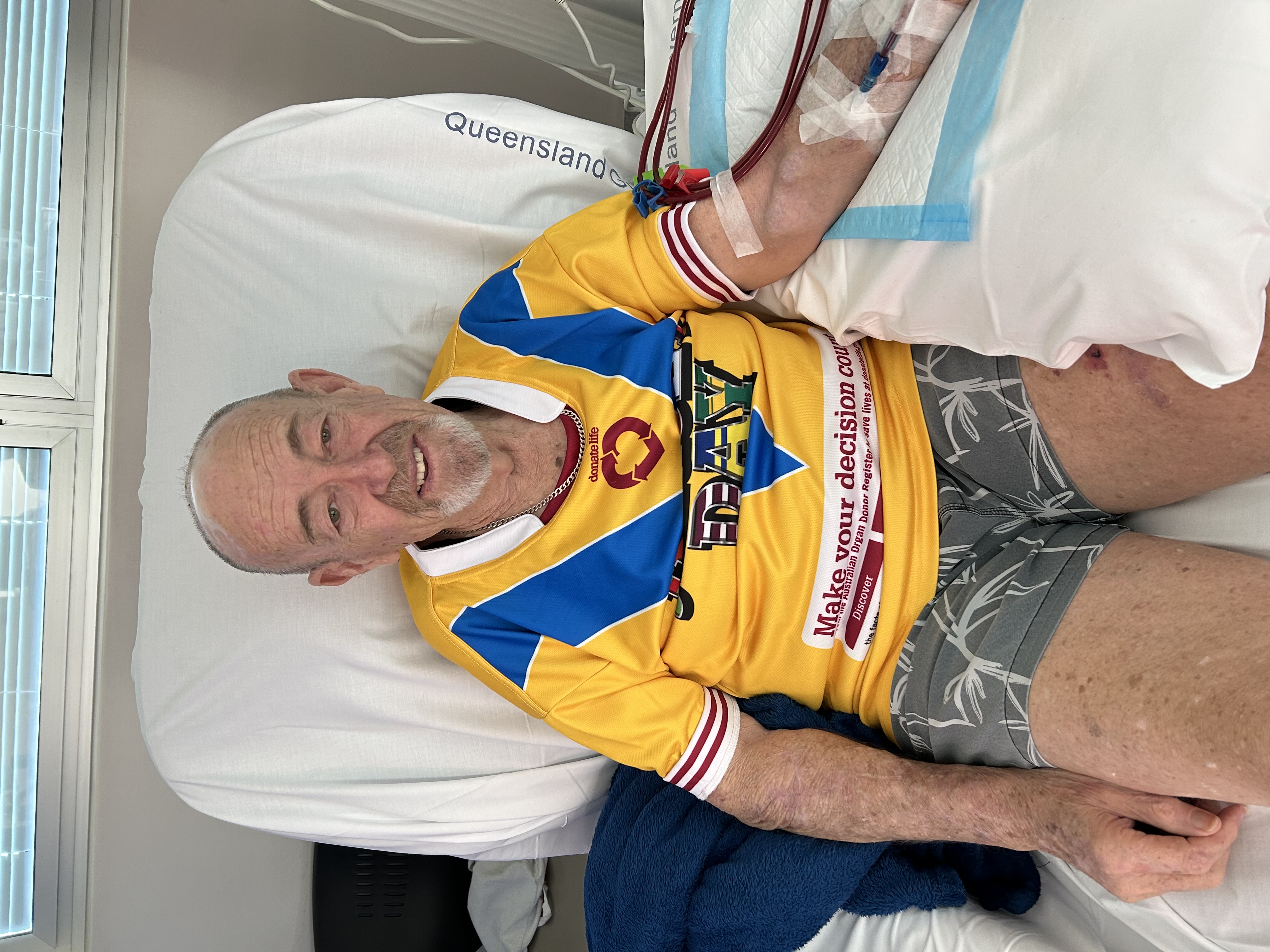 Man sitting receiving dialysis 